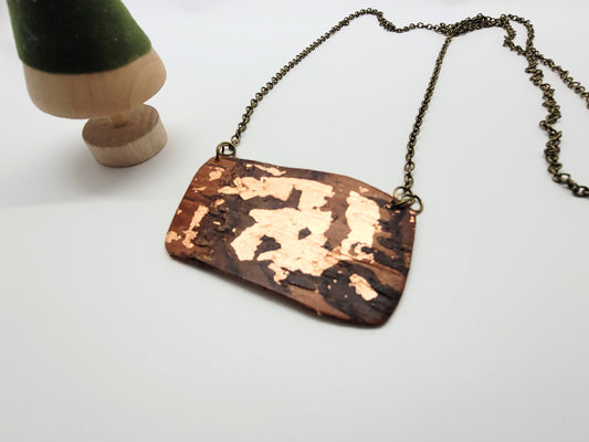Birch bark necklace with copper design