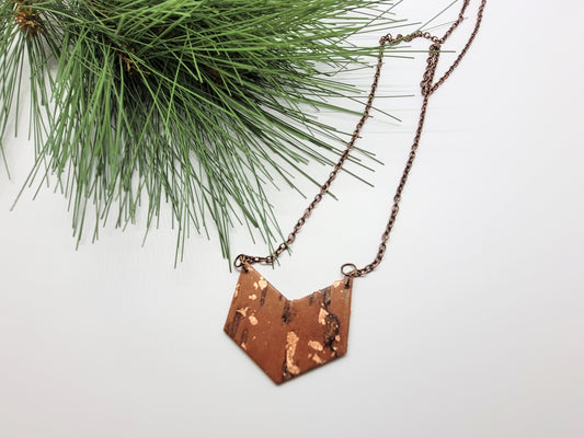 Birch bark necklace with copper design on an antique rose chain