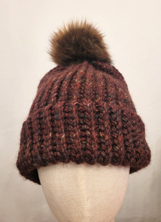 Burgundy wool and acrylic hat, faux brown pompom
