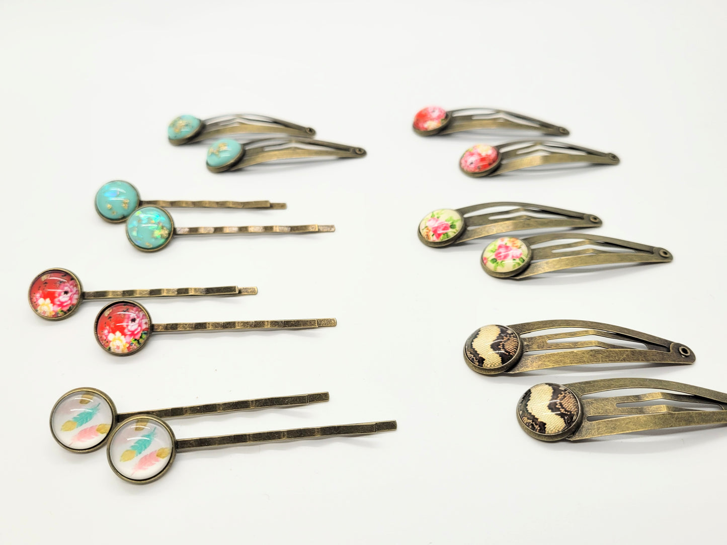 Various hairpins and barrettes, antique bronze