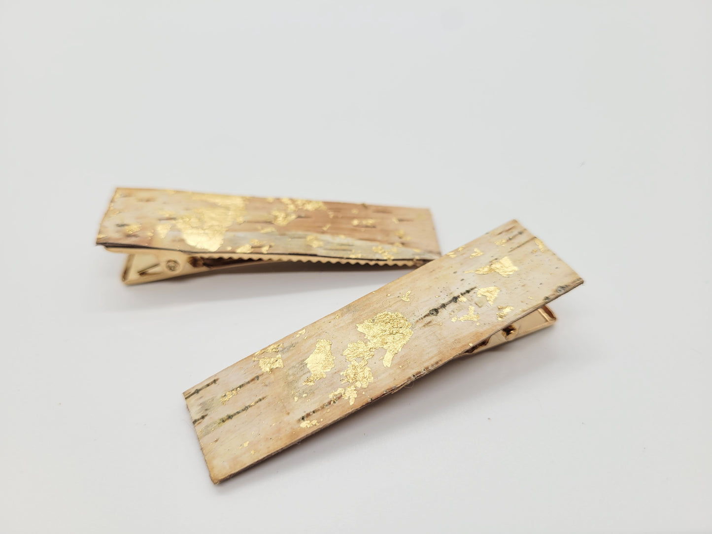 Birch bark barrettes with a gold design