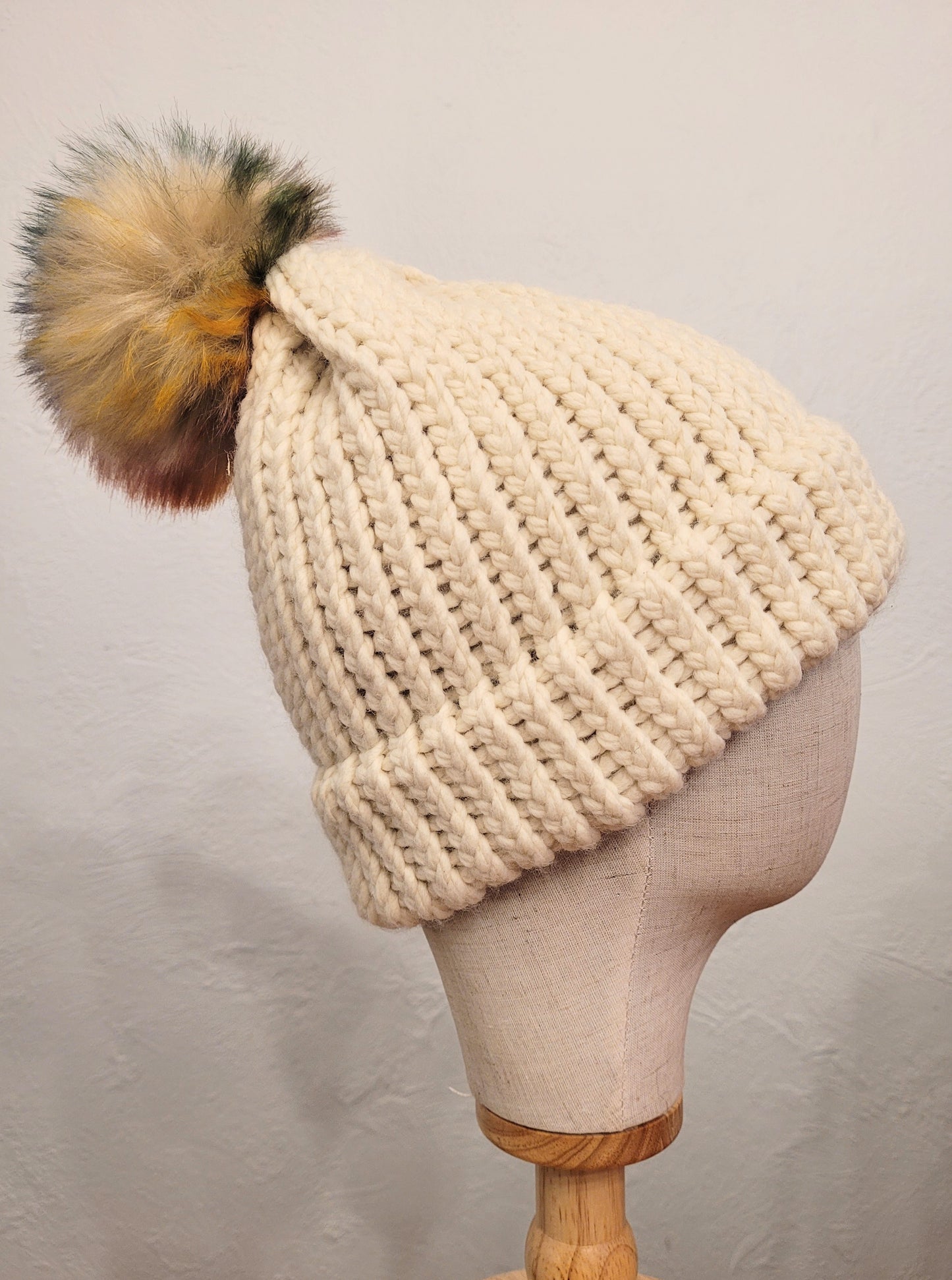 Cream wool and acrylic hat, faux coloured pompom