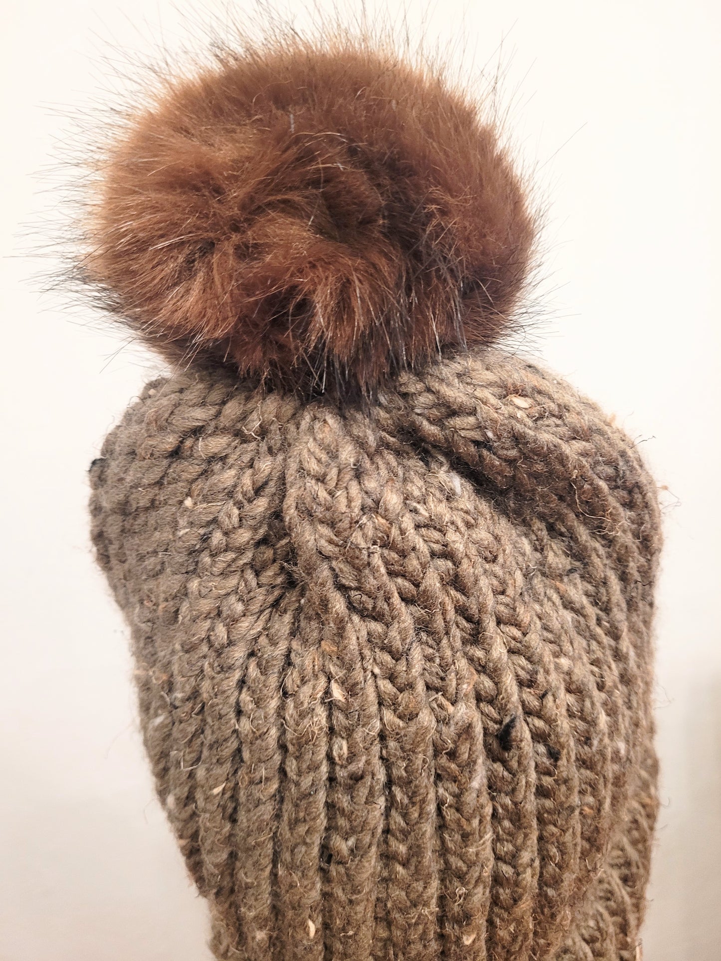 Army green wool and acrylic hat with brown faux pompom