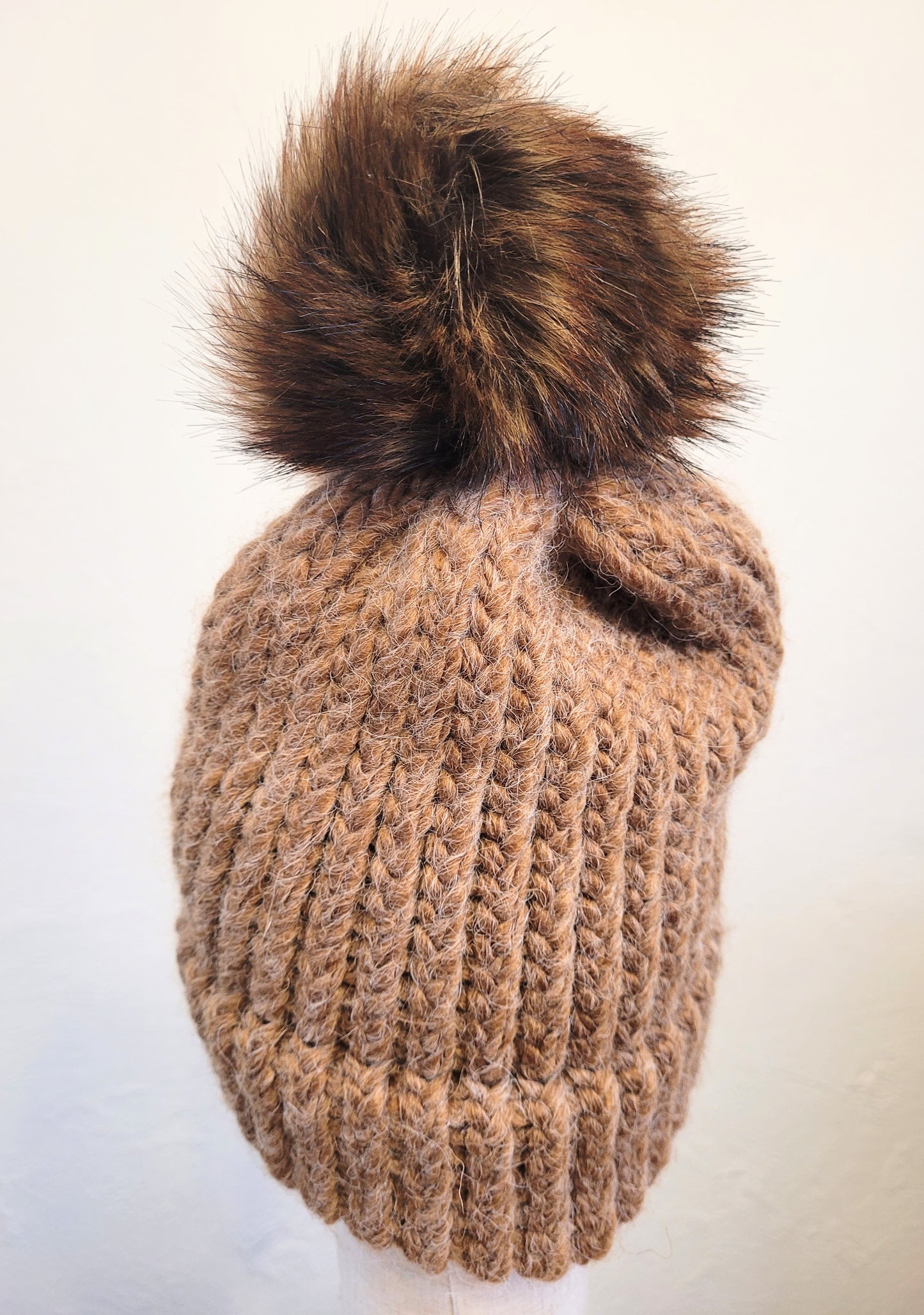 Caramel green wool and acrylic hat with brown faux pompom