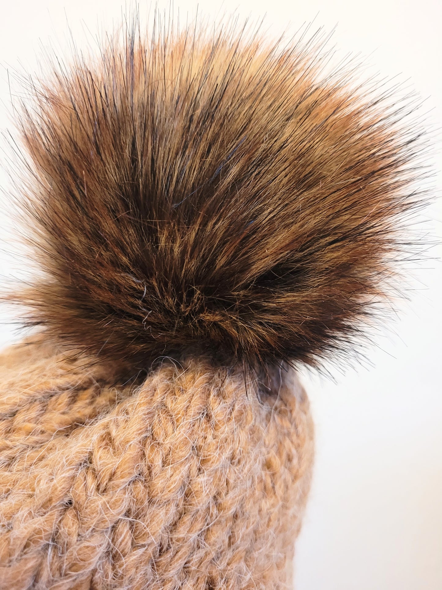 Caramel green wool and acrylic hat with brown faux pompom